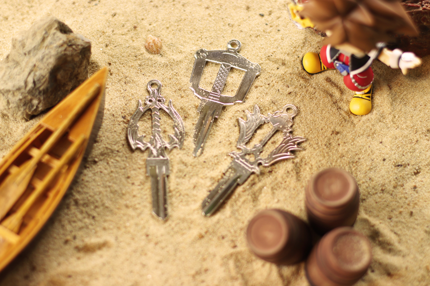 3 keys buried in the sand